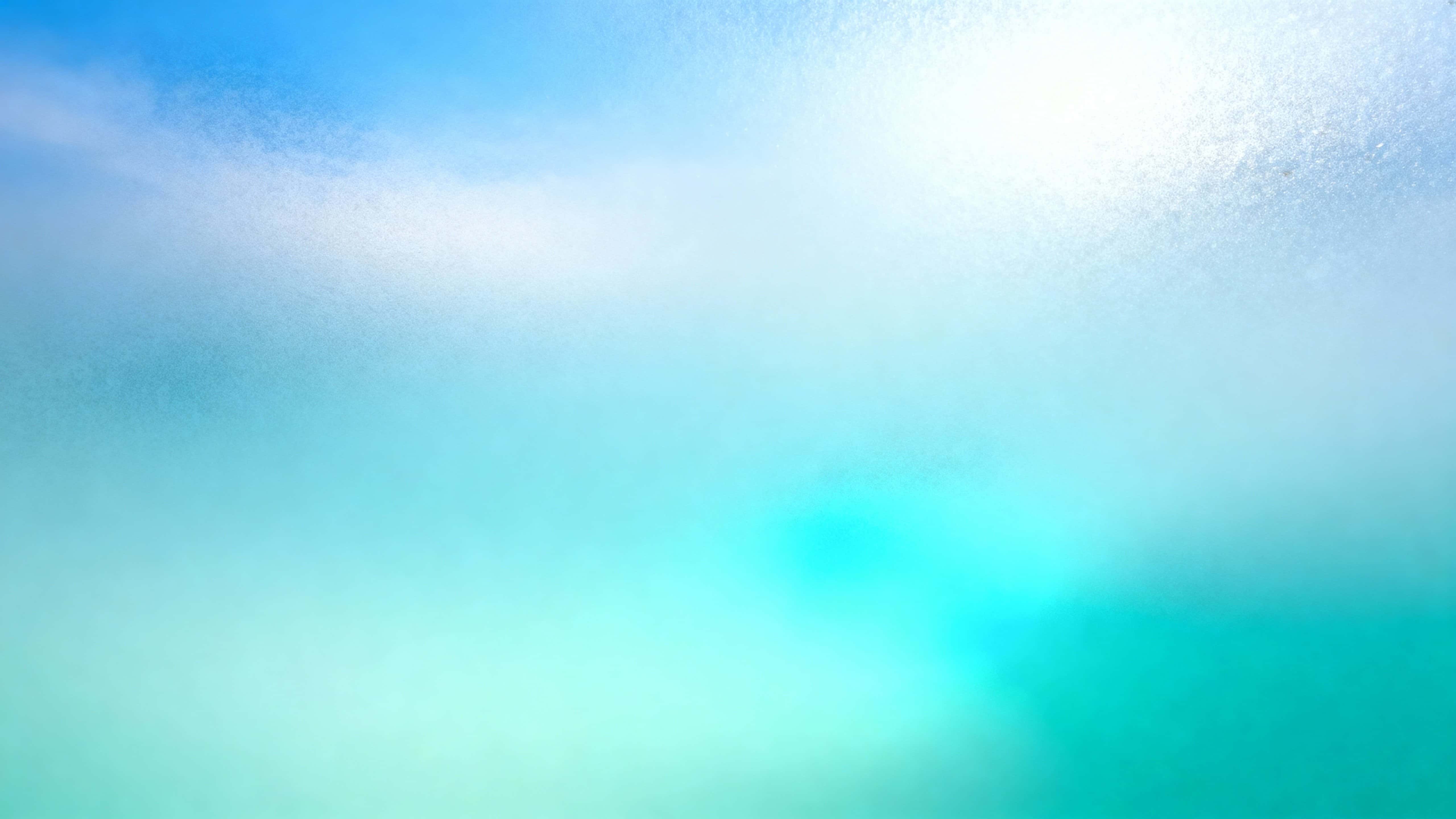 A cool, airy abstract background showing a smooth vertical gradient from pale aqua and mint at the bottom to soft sky-blue and silvery cyan at the top, with a subtle turquoise pool slightly lower-right for a gentle focal point.