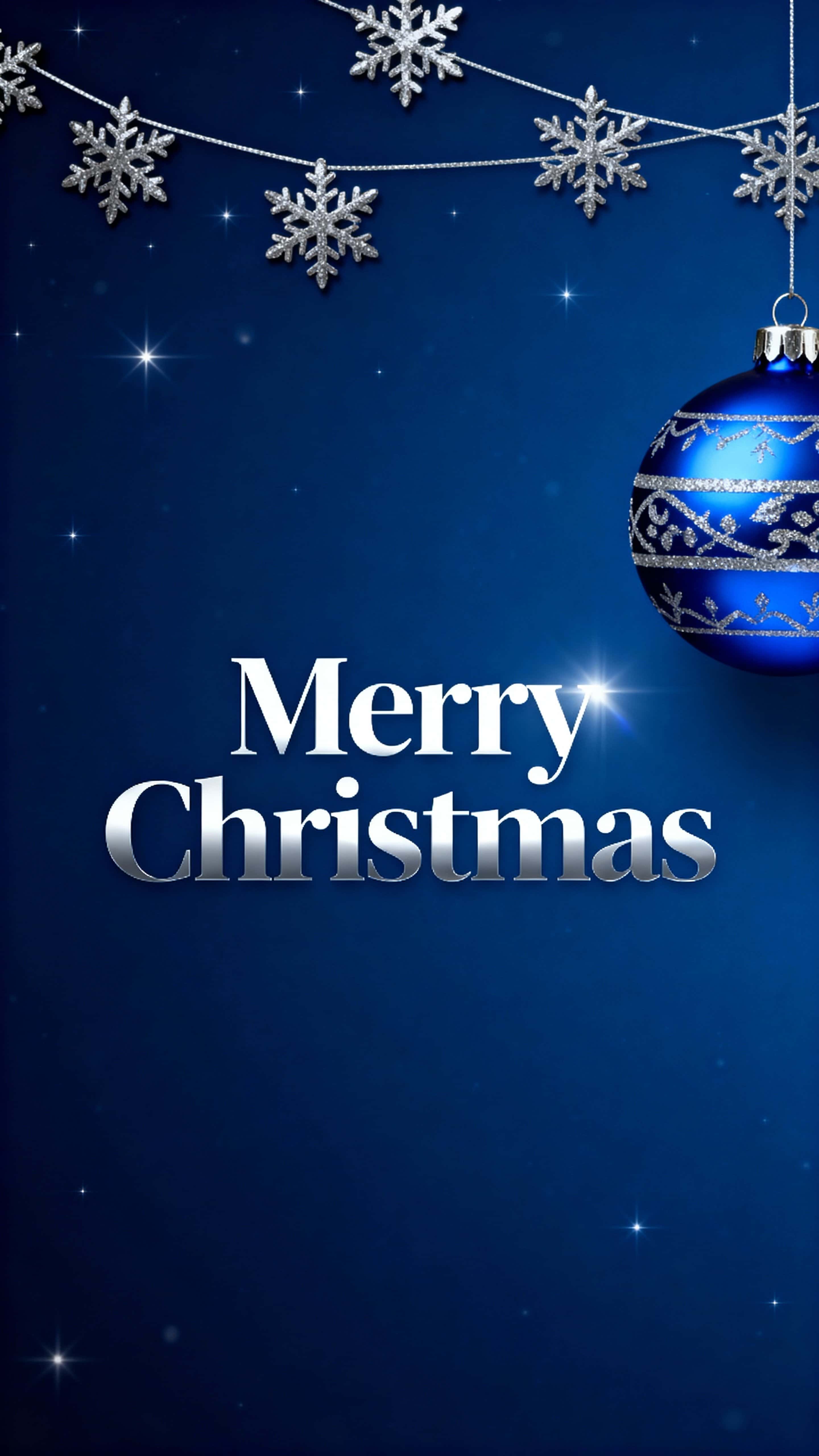 A serene midnight-blue background with tiny star-like sparkles, thin silver strings at the top hold metallic snowflakes, and a large blue ornament with silver patterns hangs to the right above bright silver 'Merry Christmas' lettering.