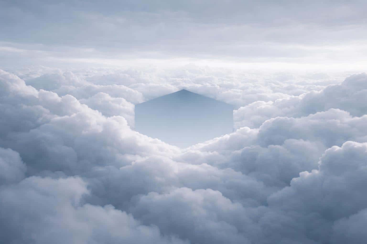A minimalist landscape photograph of clouds forming a subtle geometric gap in the sky, composed for a 3:2 wallpaper with calm, meditative mood.