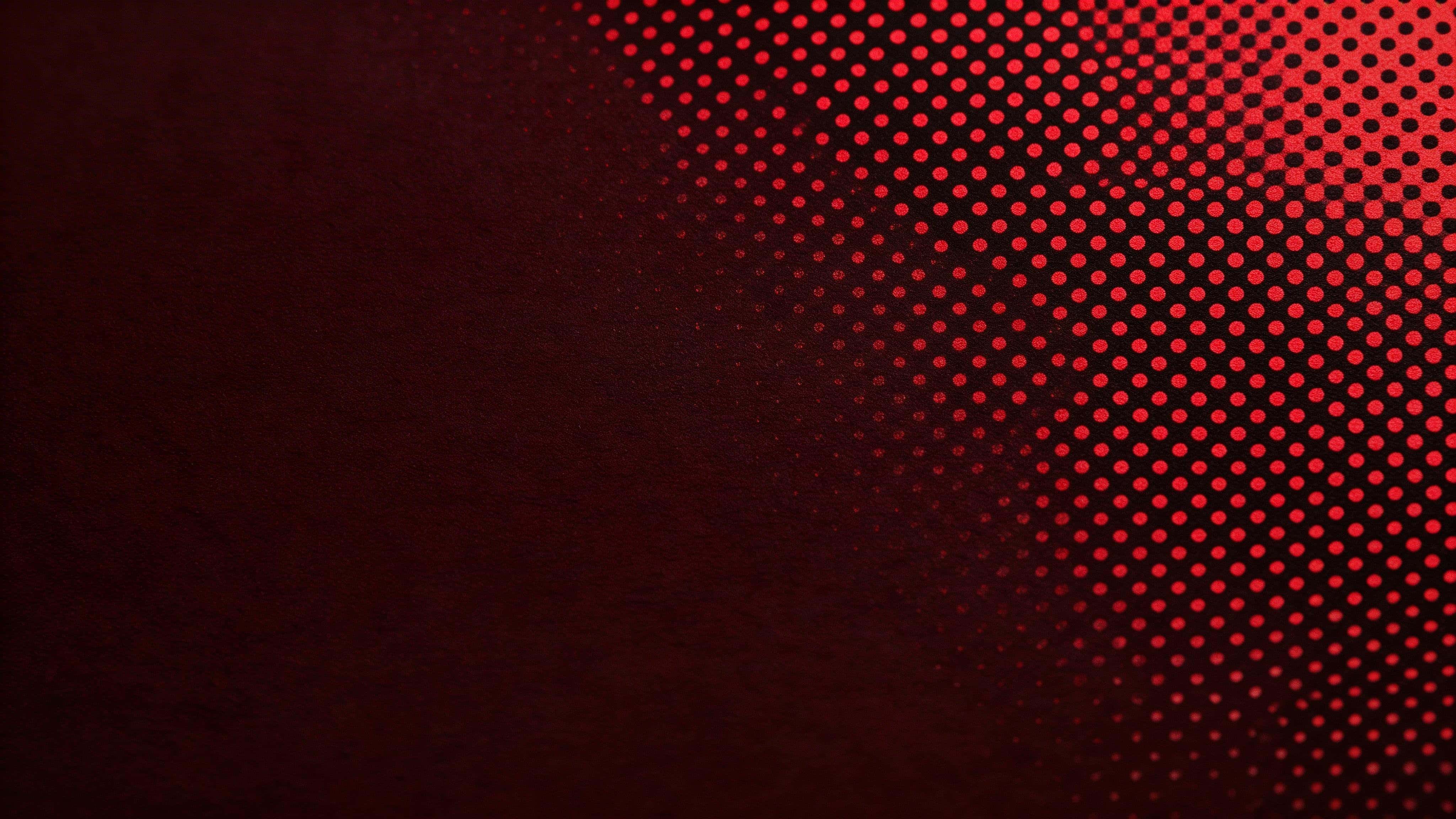 A 16:9 crimson halftone gradient with dense dots clustered in one corner fading to calm negative space, evoking premium screen print with deep reds, crisp micro-dot texture, and OLED-ready blacks.