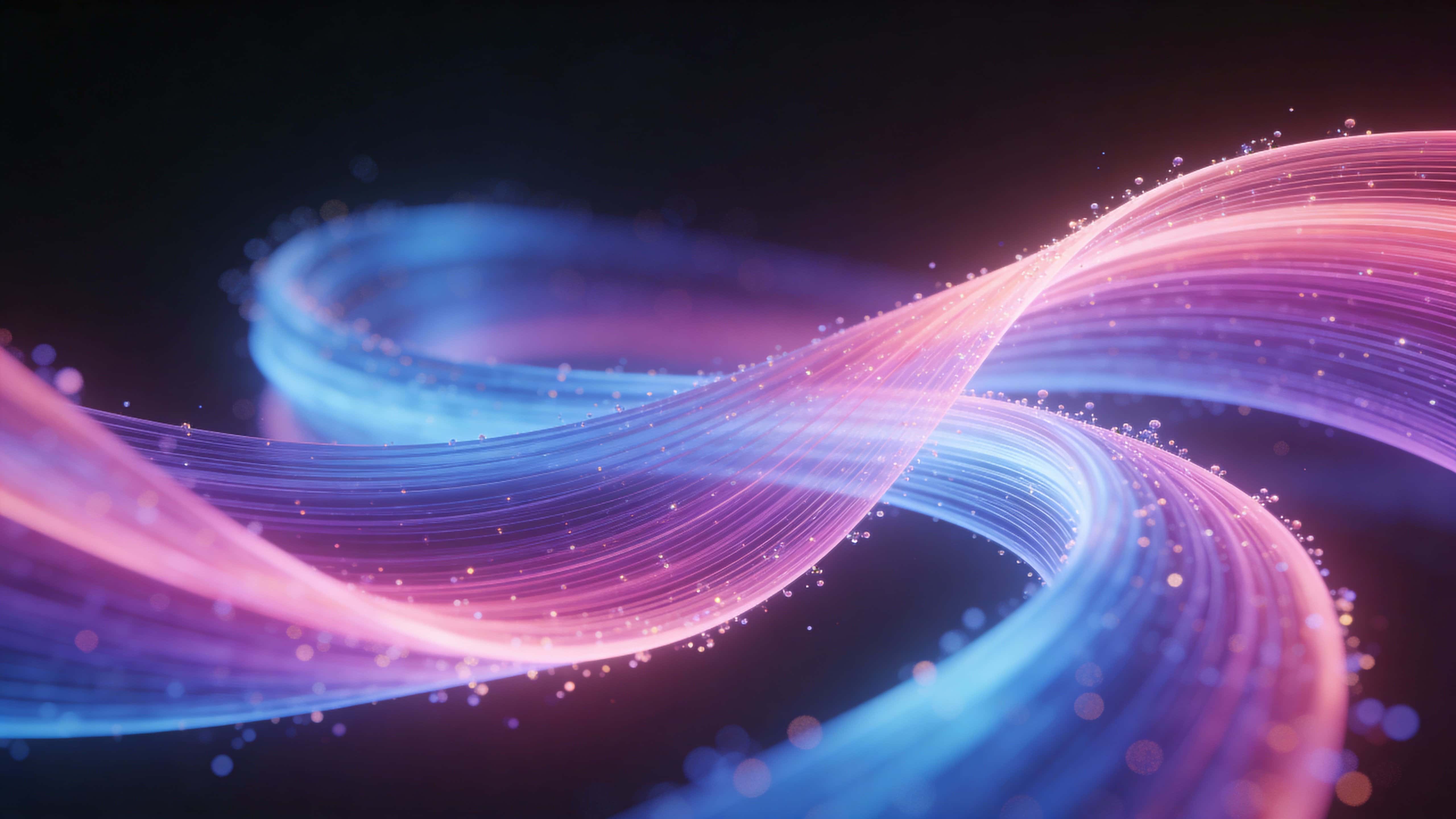 A broad band of flowing pink, blue, and violet energy ribbons stretches across a 16:9 frame, intertwining with glimmering particles and soft depth while leaving ample top negative space.