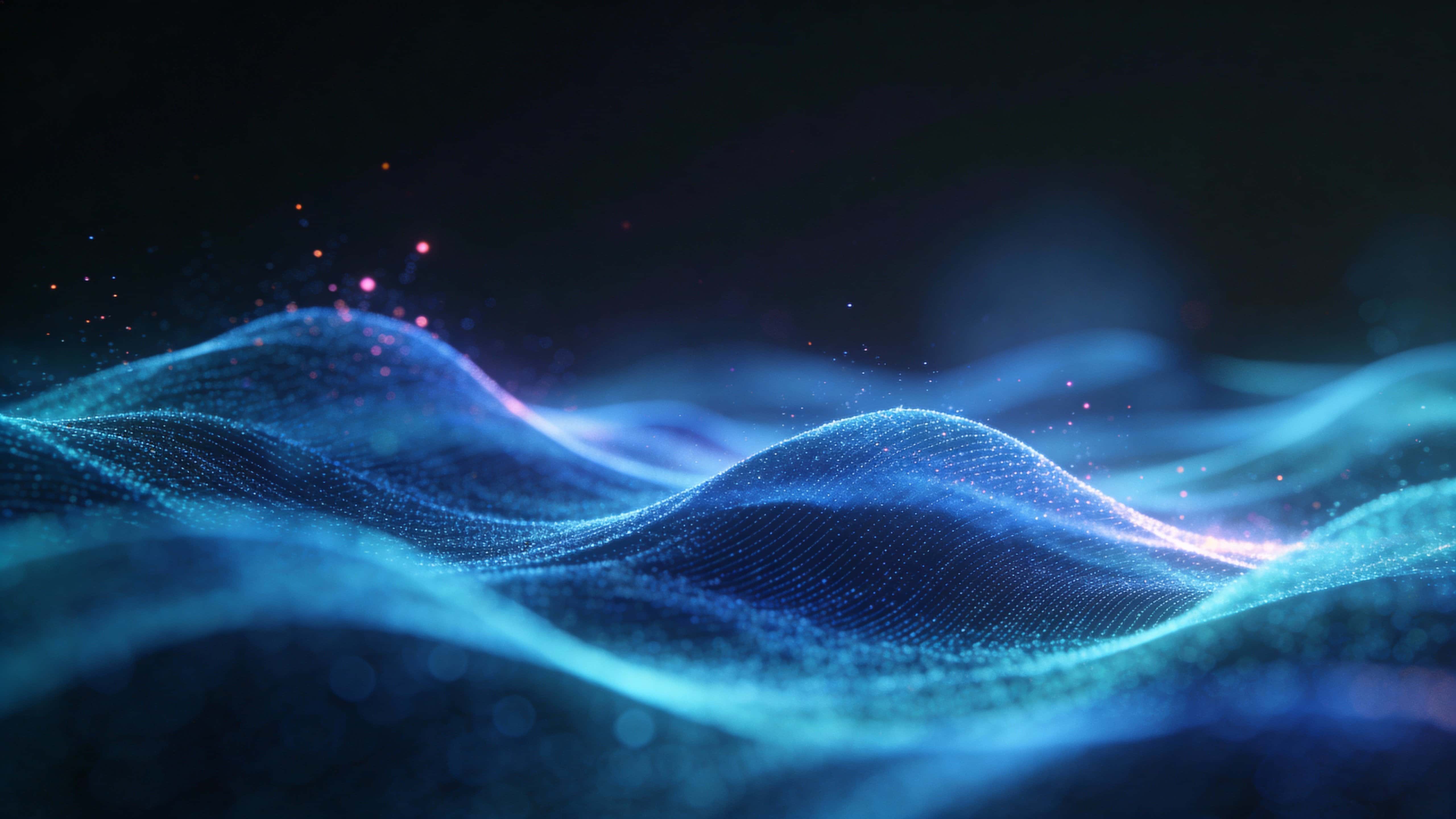 A flowing field of luminous energy waves sweeps across a dark backdrop into smooth layered blue and cyan curves with drifting particles, soft distant haze, and warm pink sparks.