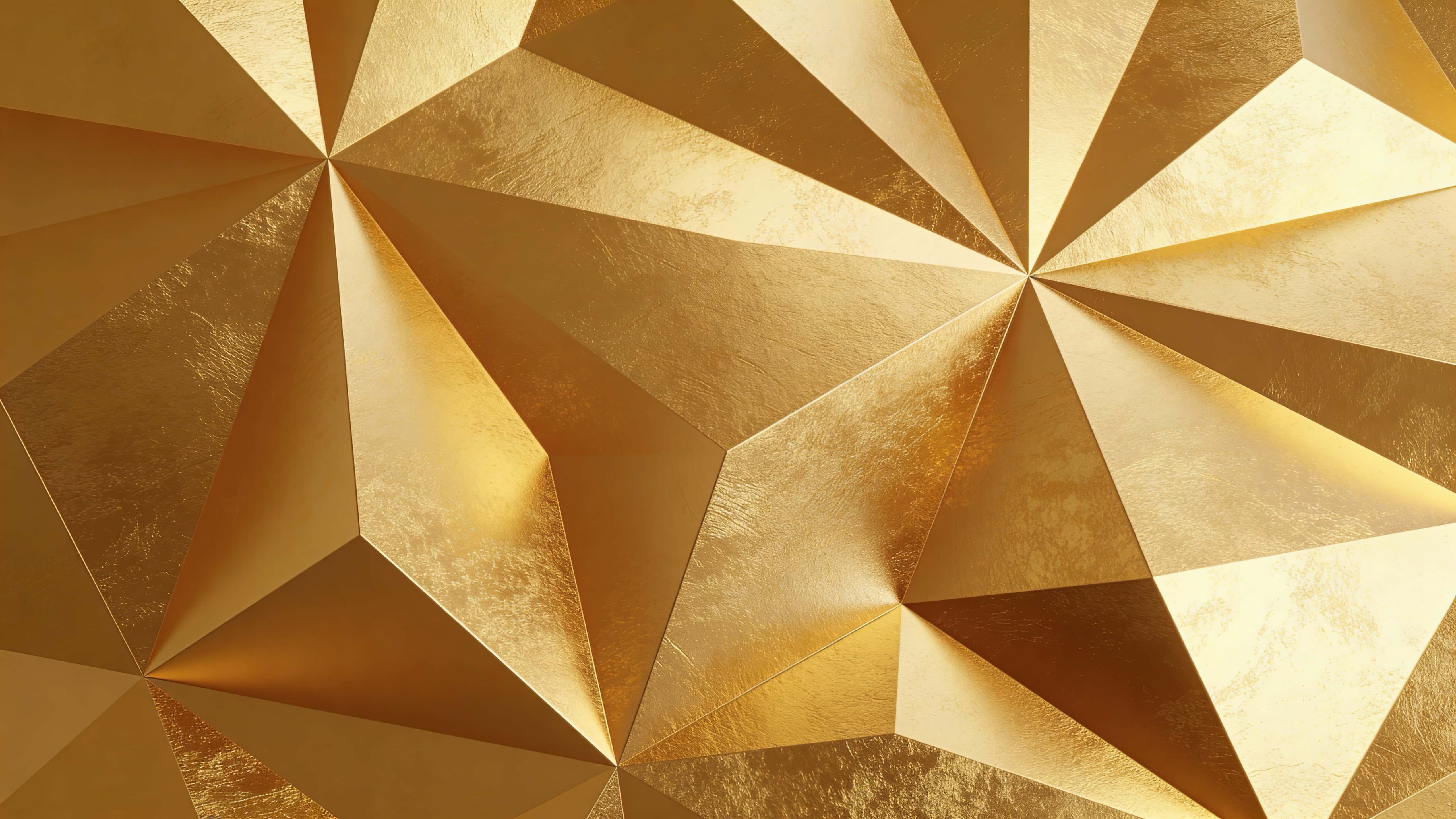 Flat, centered 16:9 background of contemporary geometric gold foil with large soft-edged facets forming an abstract low-relief pattern and warm, controlled highlights.
