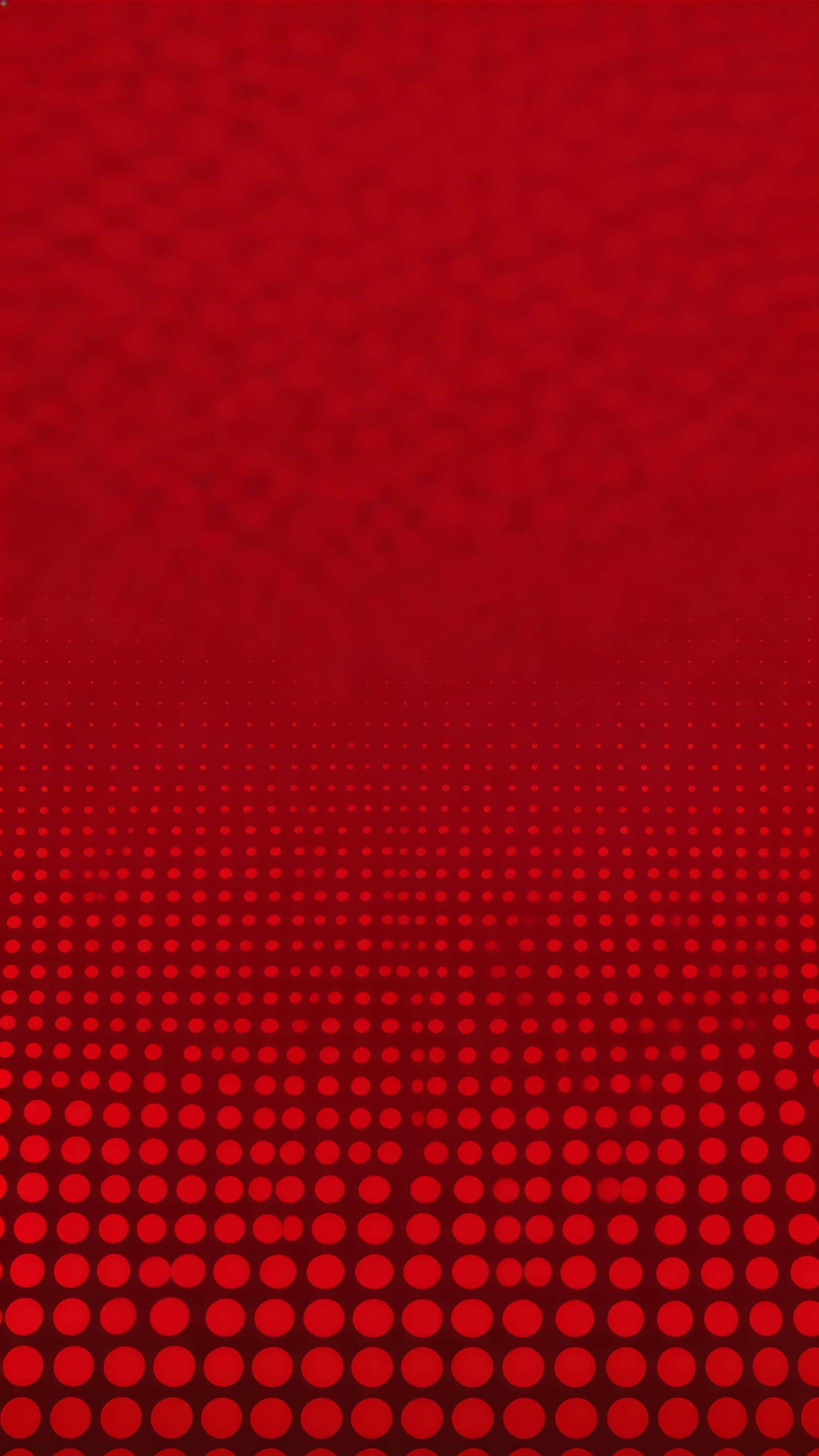 9:16 portrait seamless halftone field in deep reds with a controlled dot-size gradient, denser at the bottom and a smoother lighter fade in the upper-middle to preserve negative space.