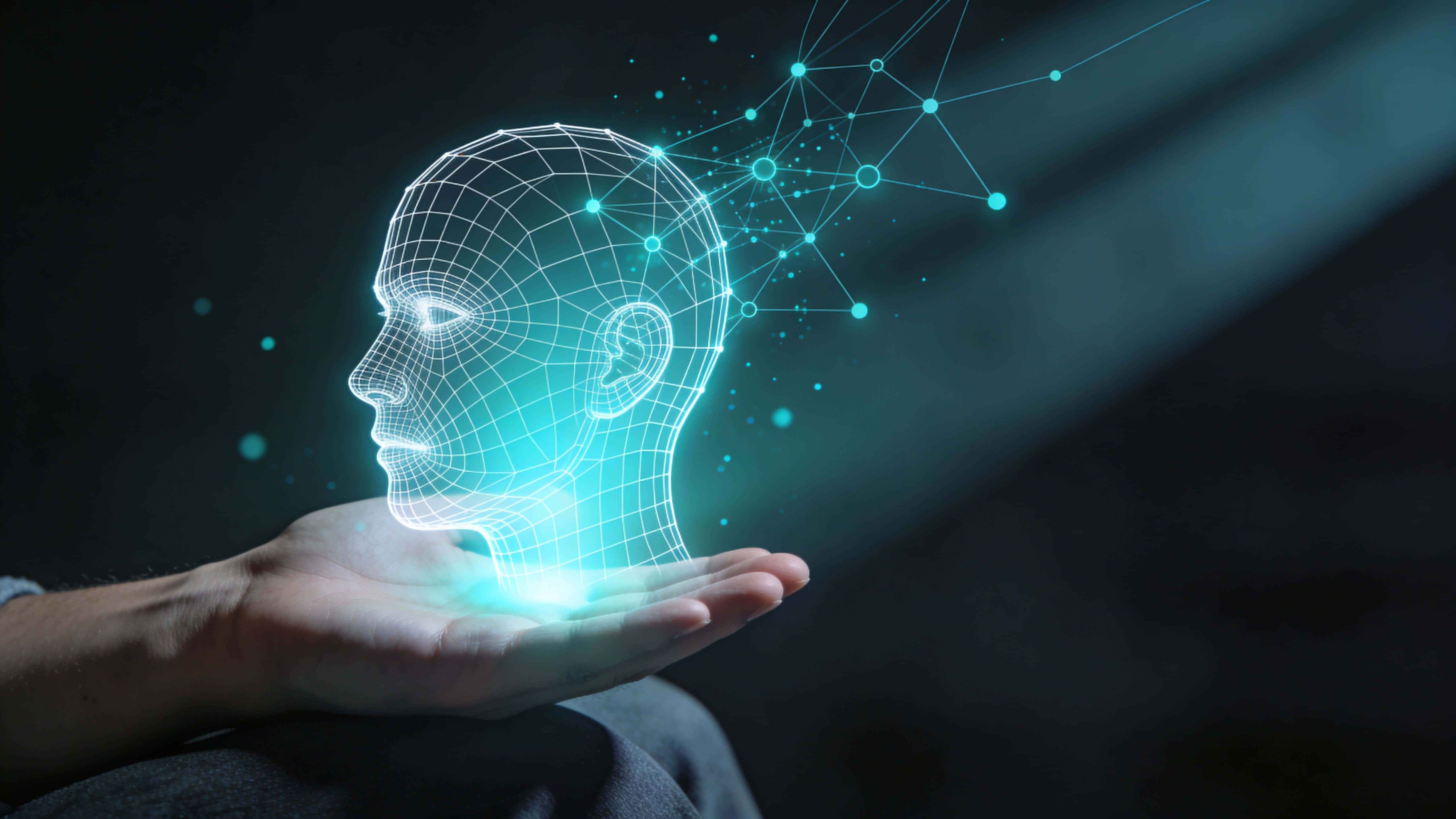 A palm-up human hand in deep charcoal space presents a glowing wireframe half-head in cyan and teal, with flowing data nodes and floating particles drifting to the right.