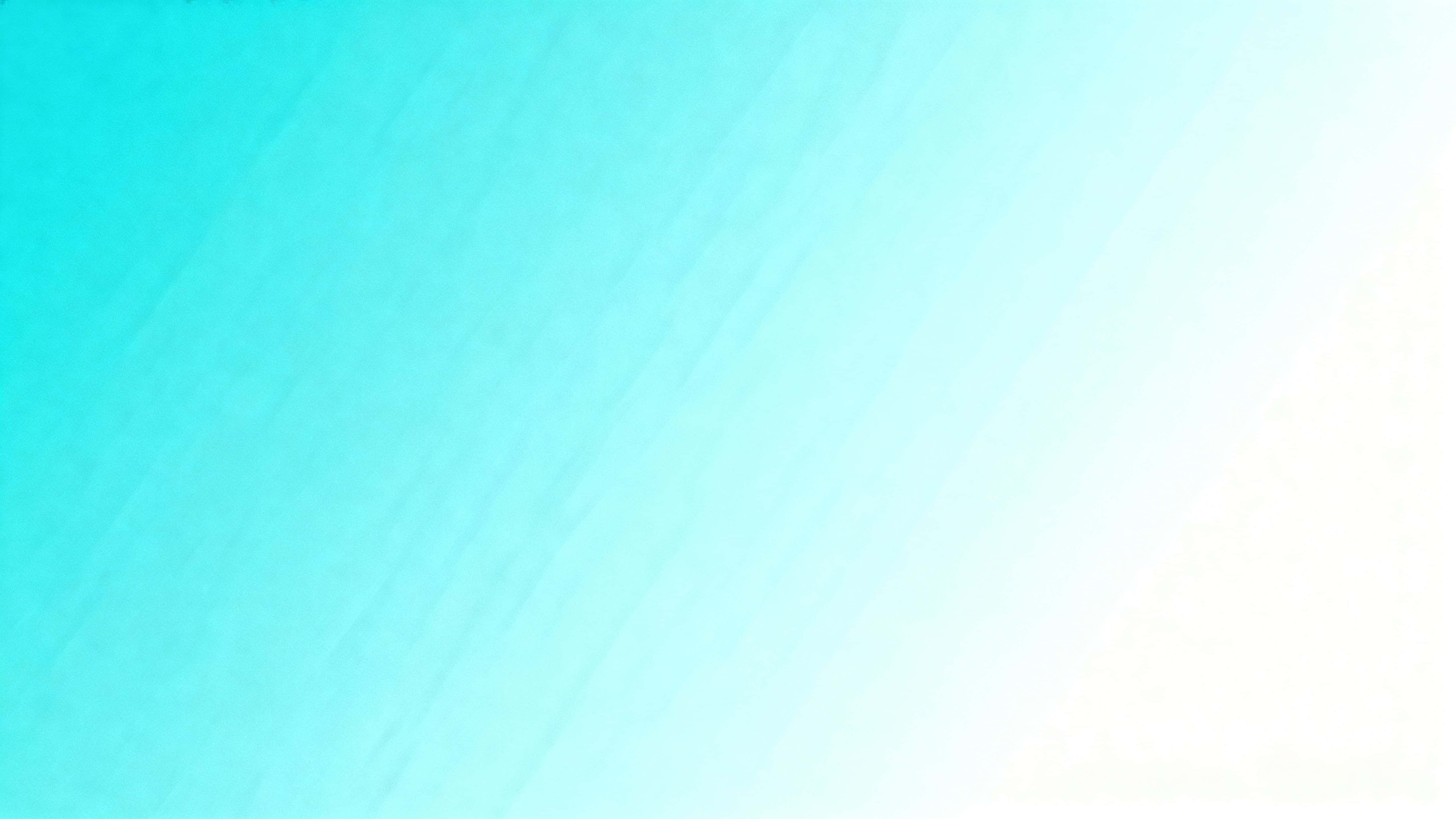 A flat, uniformly matte panel fills a 16:9 frame with a diagonal, seamless gradient from cool aqua-mint in the lower-left to pale sky-blue and near-white in the upper-right.