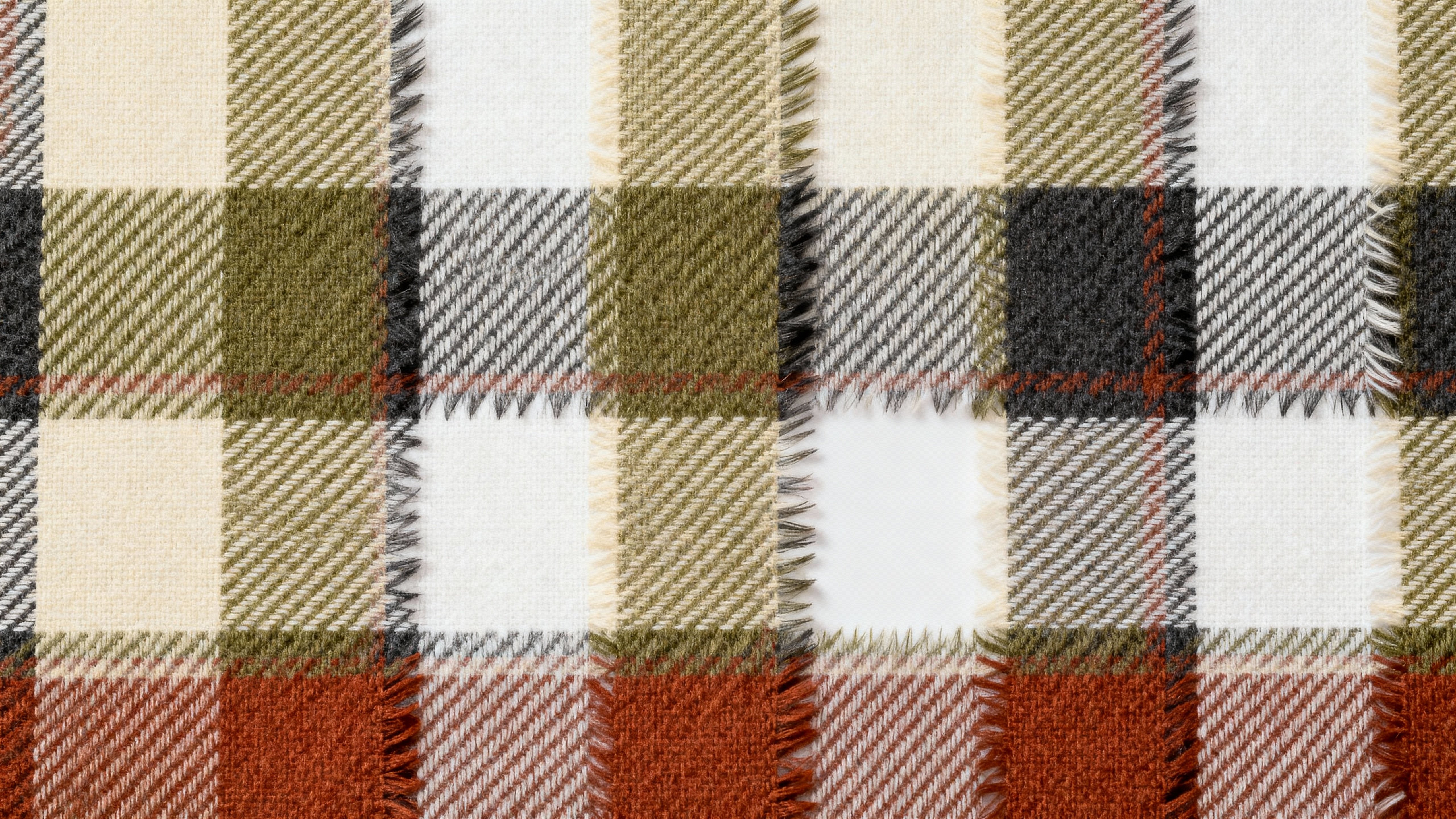 A modern plaid woven textile spans the frame in a calm, structured composition with soft intersecting bars of pine (#2F5D3A), cream (#F5F0DC), charcoal (#333333), rust (#B0552A), and warm beige (#D9C7B0), with feathered edges, flat depth, a