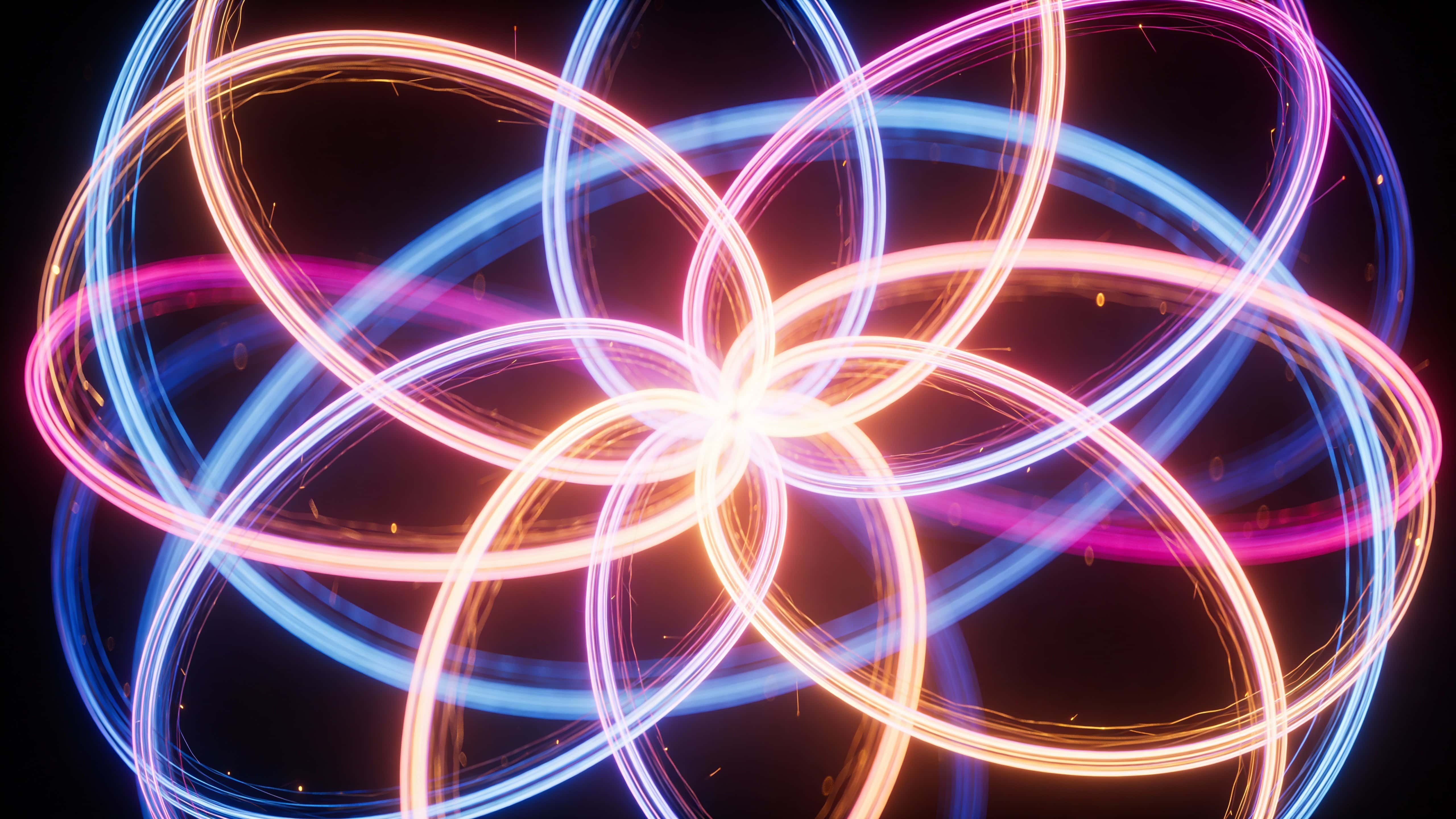 Intertwined glowing neon loops form a loose spherical abstract, curving from cool blue to warm magenta and gold over a dark, softly ambient backdrop.