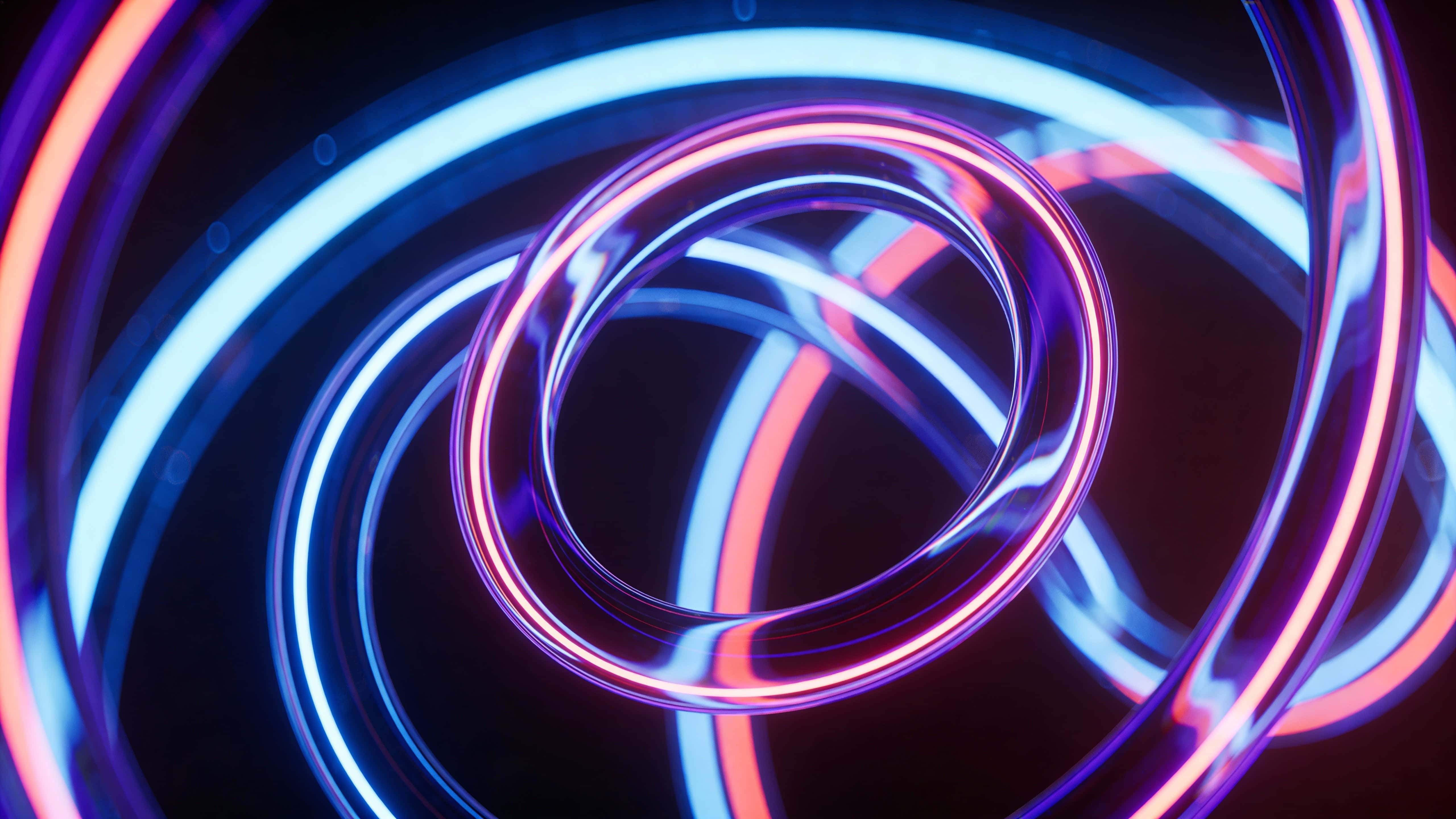 Glowing neon loops intersect and float against a dark gradient, blending electric blue, purple, and warm coral with subtle inner reflections and energetic refinement.