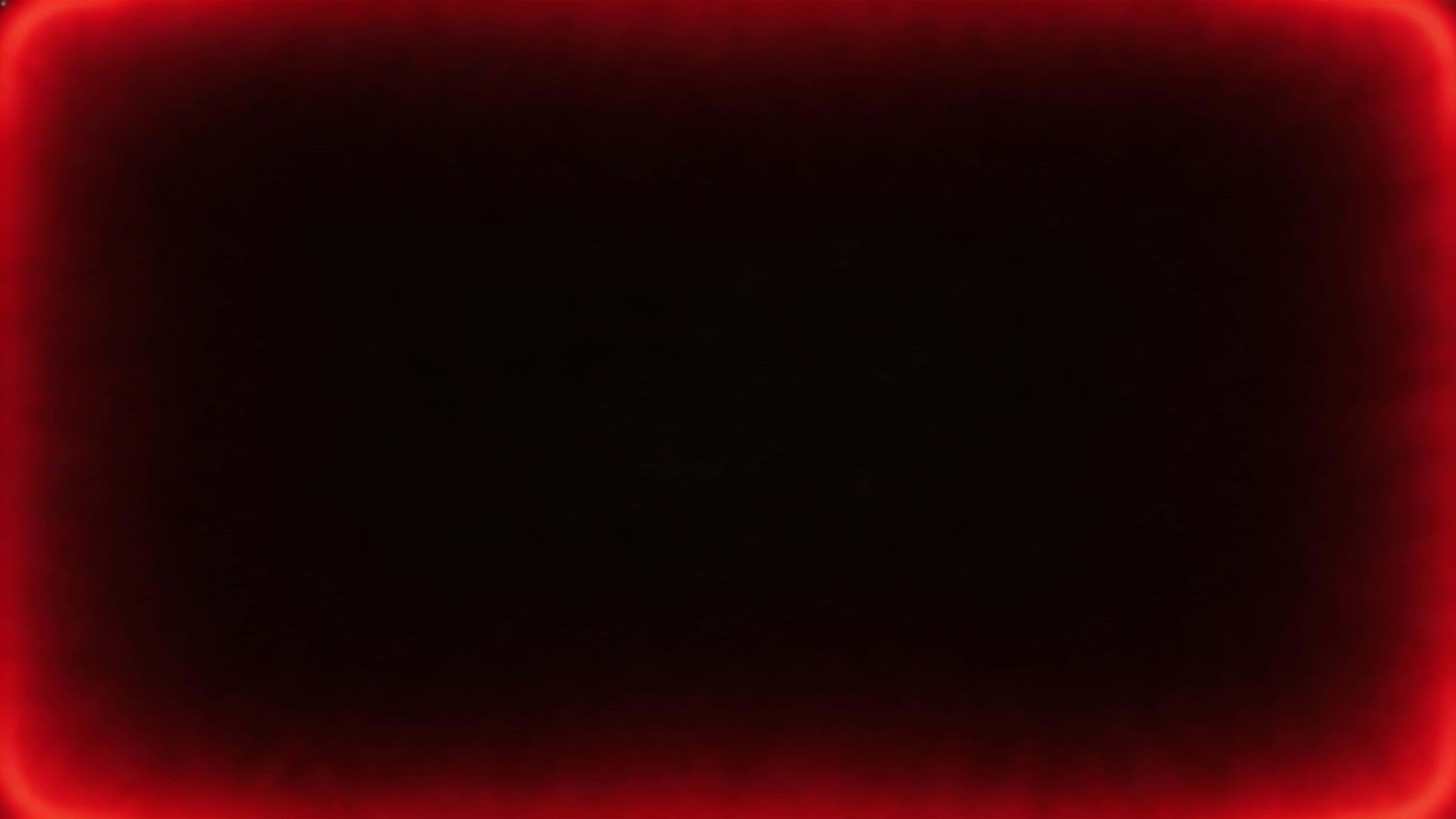 Cinematic 16:9 studio frame with a near-black background and soft red neon rim-light halo forming a subtle vignette, preserving clean central negative space with smooth gradient.