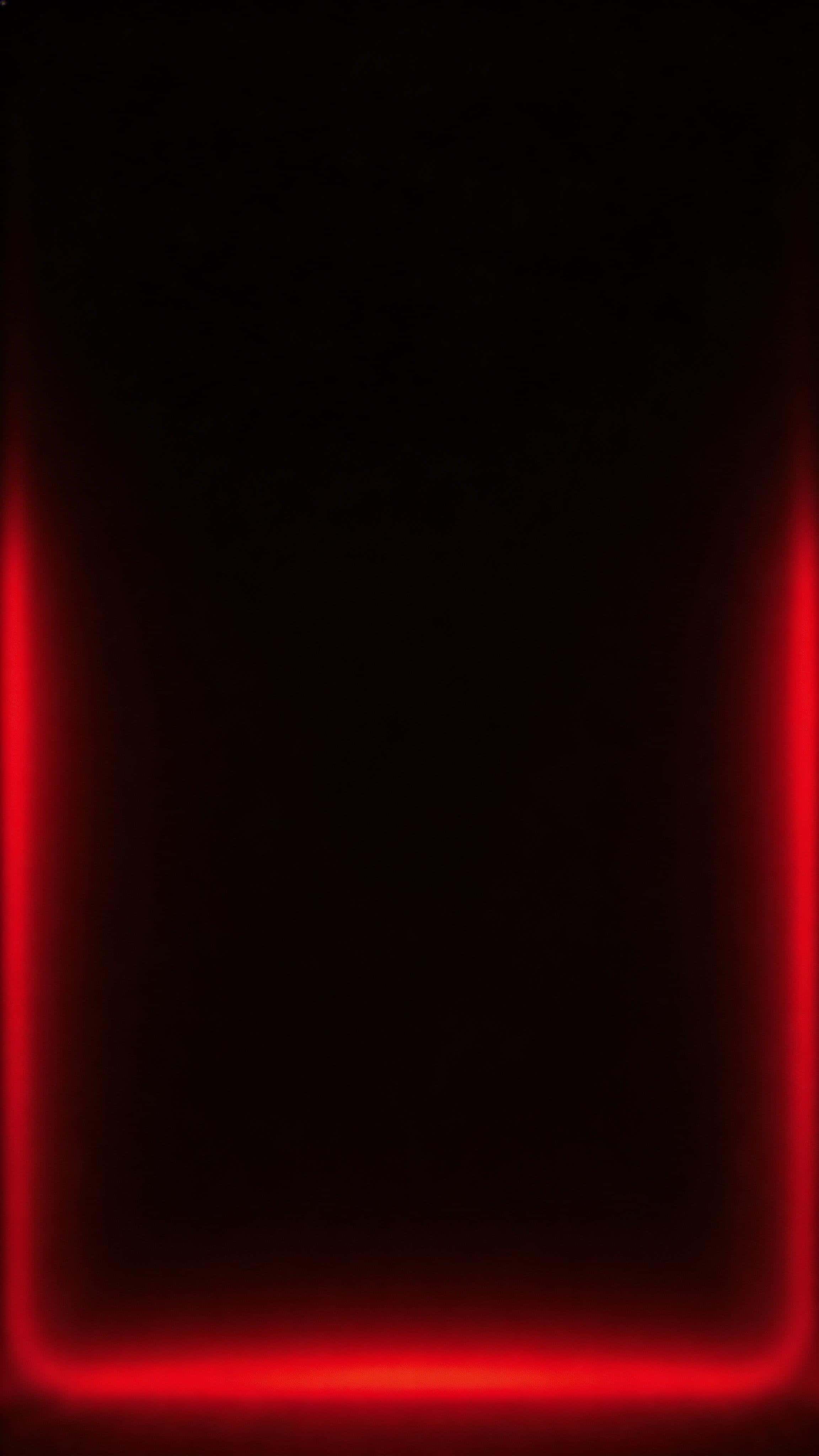 Cinematic 9:16 vertical wallpaper of a near-black background with a soft red neon rim glow at the edges, a clean smooth center, and the brightest glow kept below the upper third.