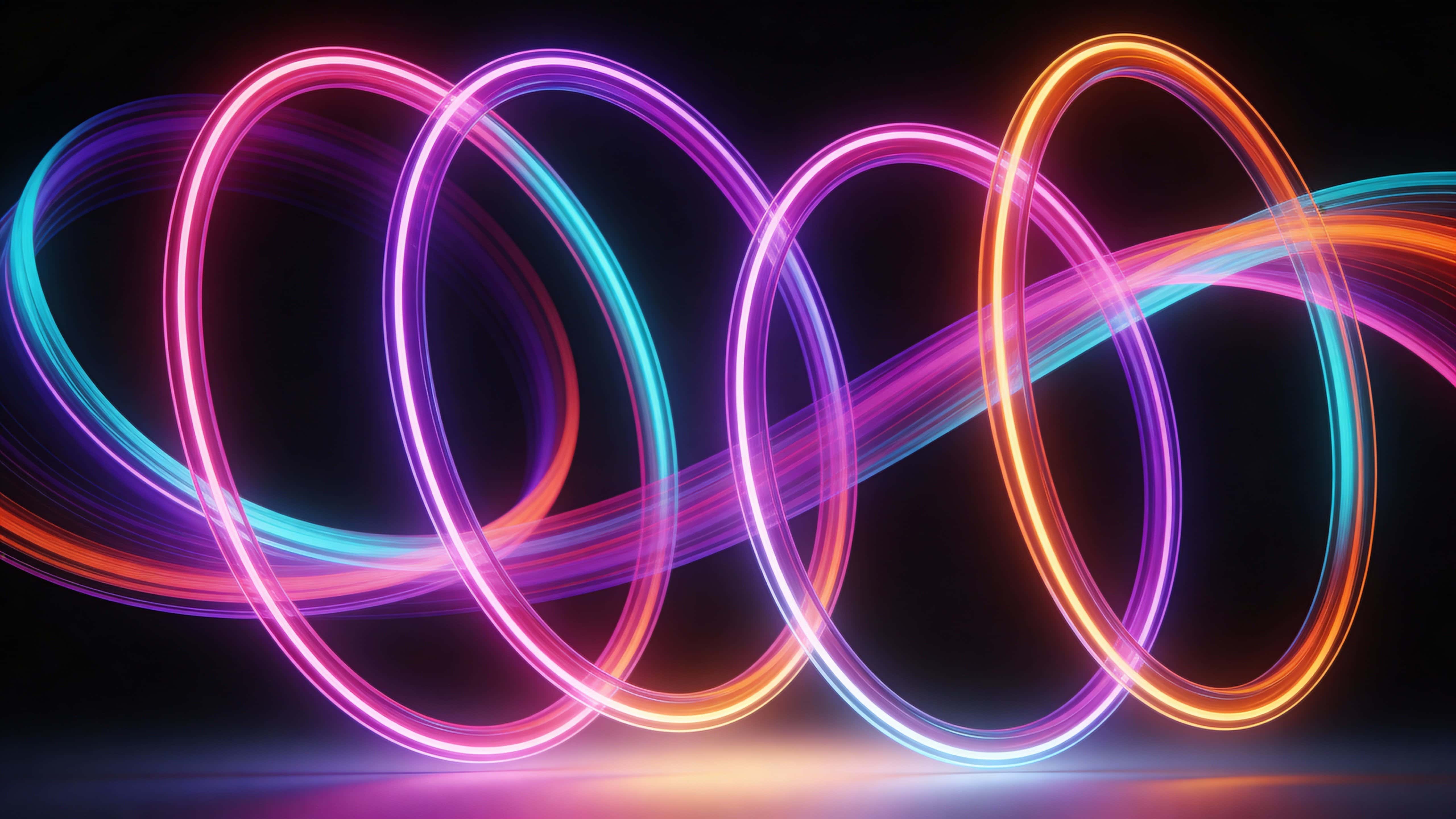 Neon rings rotate gently in a dark 16:9 frame, their luminous pink, purple, cyan, and orange bands blending smoothly against a soft base glow for a futuristic, elegant scene.