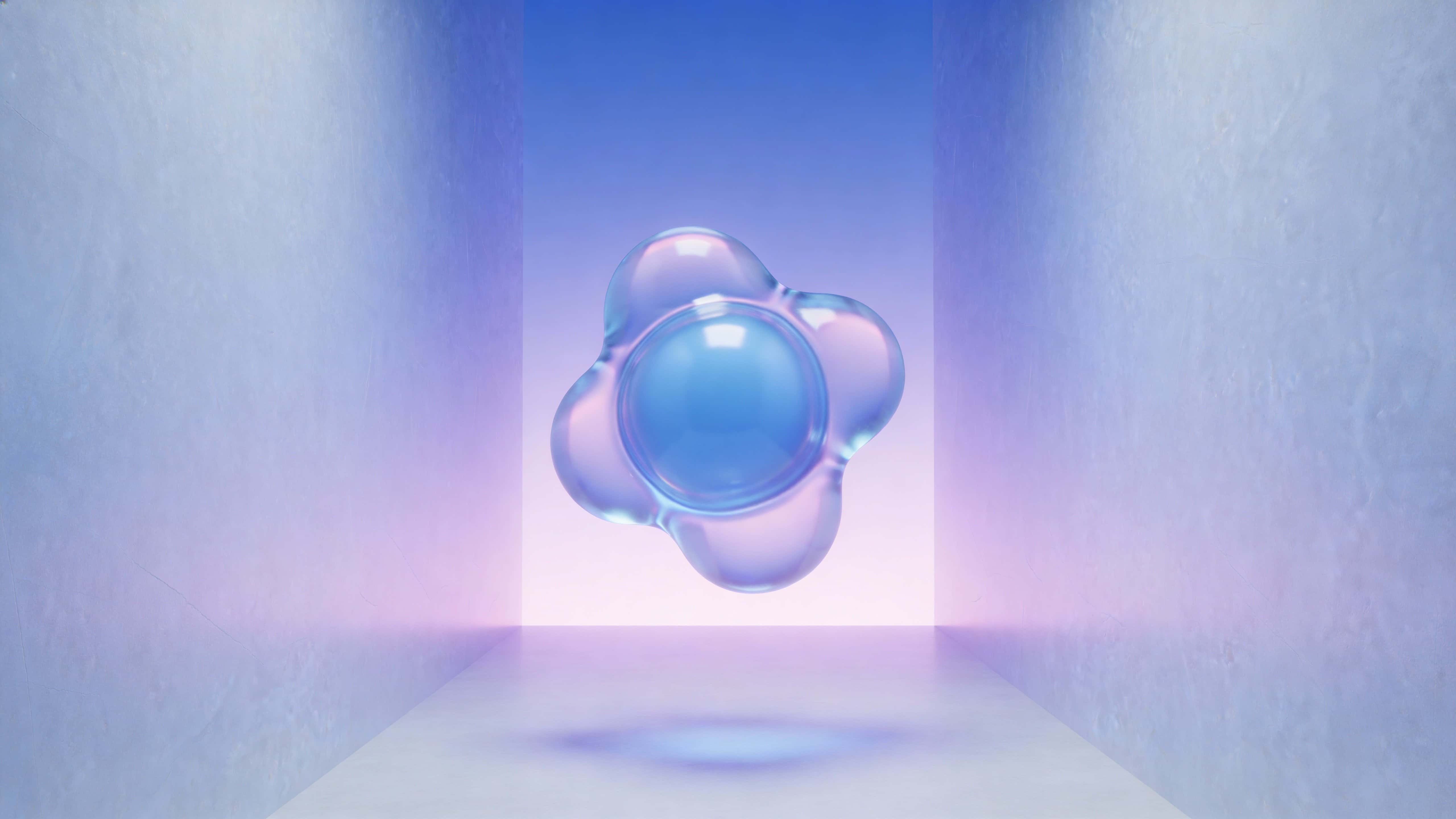 A minimal, clean 3D scene showing a single organic jelly-like blob with a smooth, soft blue–purple gradient and subtle inner glow, gently floating against a spacious dark backdrop.