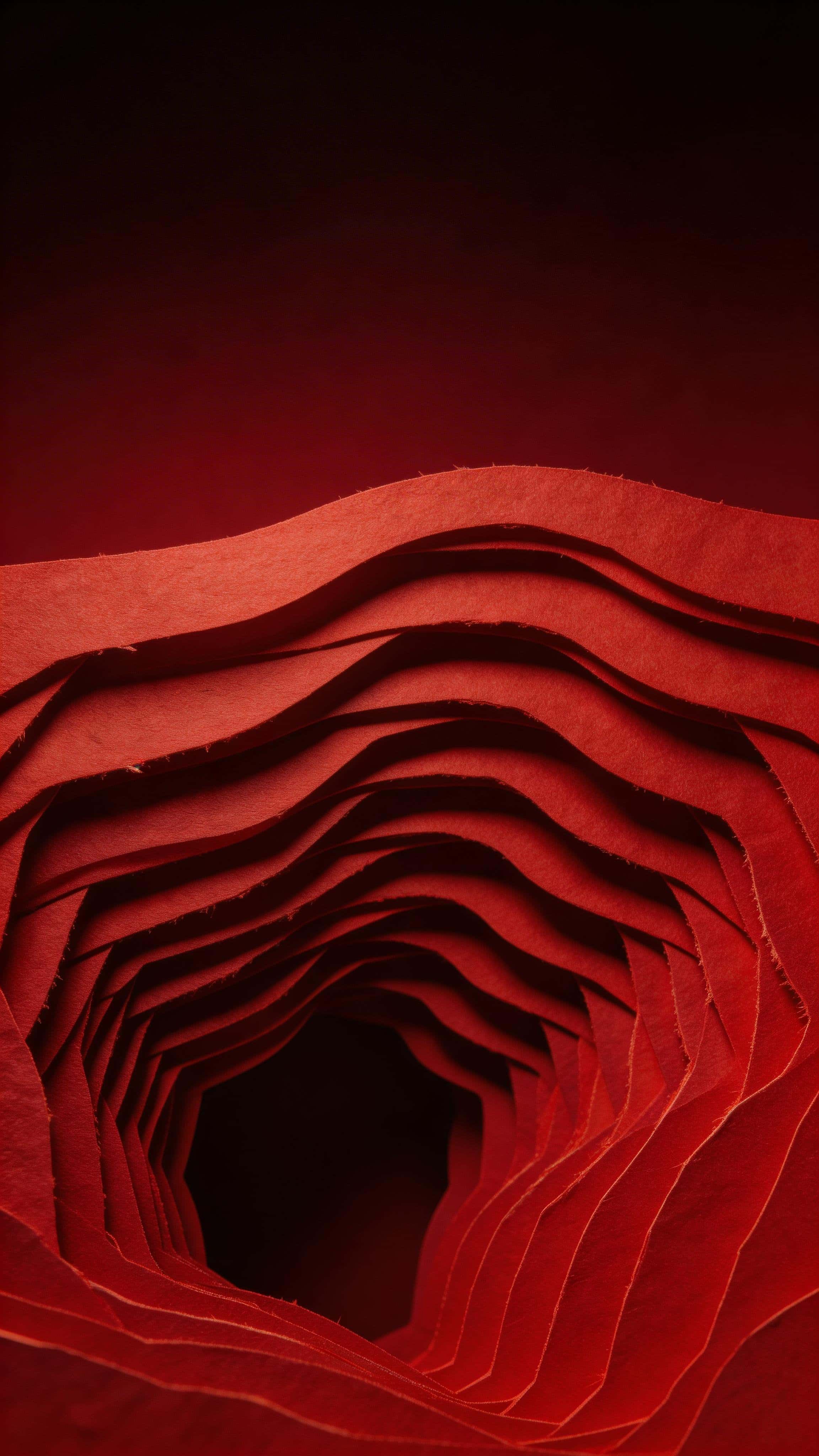 Vertical 9:16 paper-cut layered relief in matte crimson with 12–20 ribbon-like layers forming an abstract sculpted portal low in the frame and a dark calm top gradient.