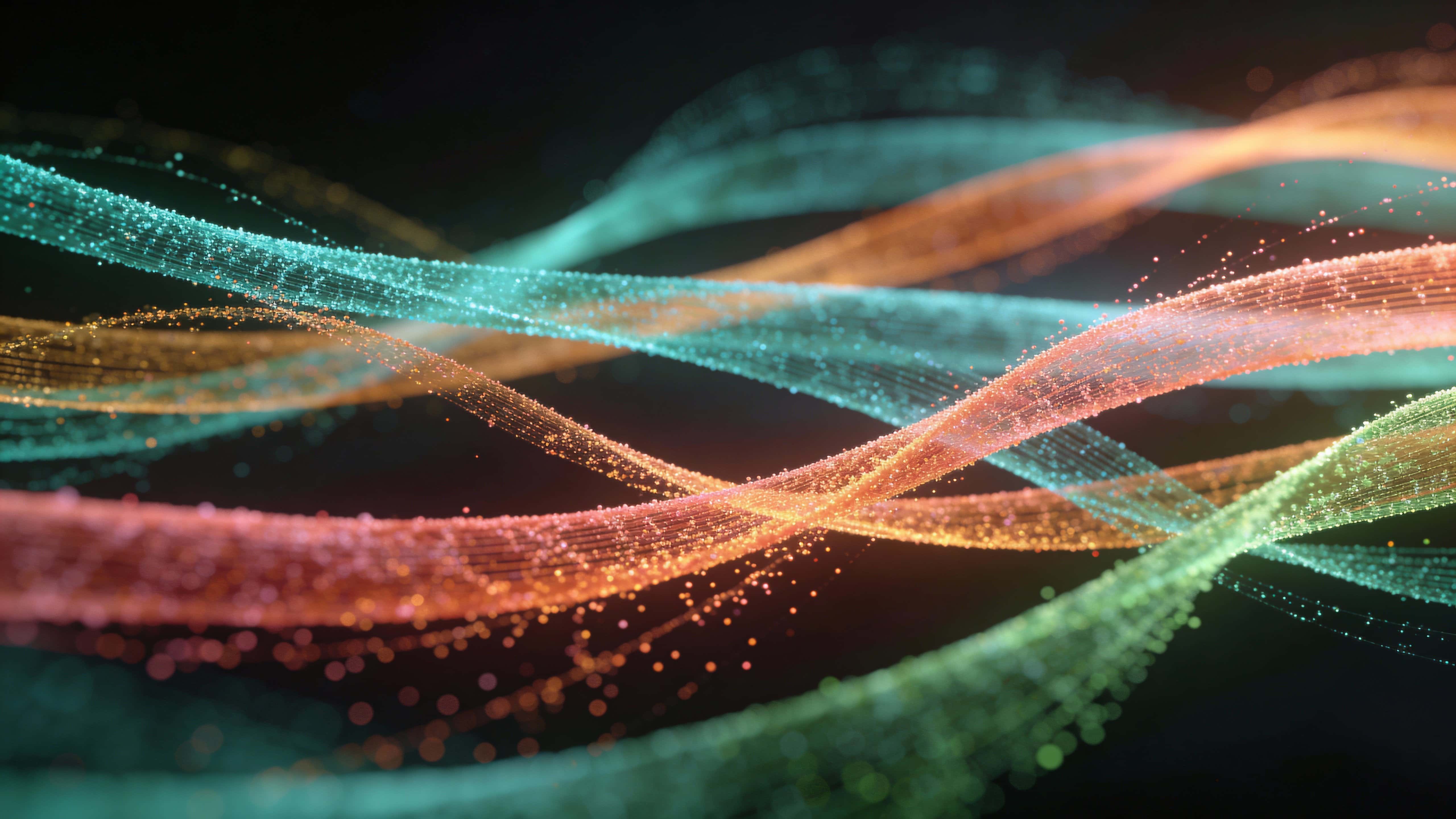 A field of multicolored particle ribbons weaves horizontally across a dark 16:9 frame, glowing teal, amber, coral and soft green with clustered intersections and airy edges.