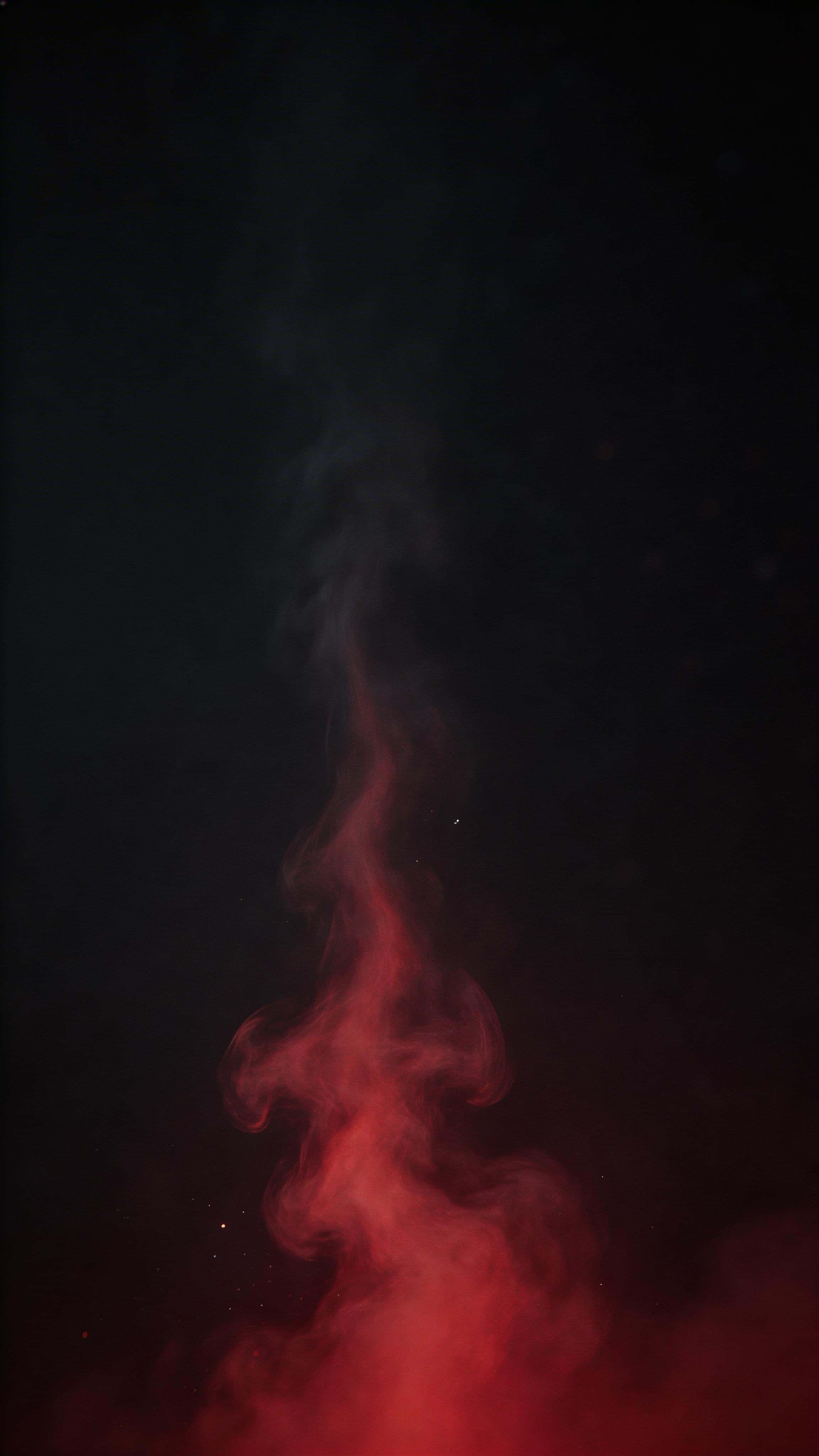 Vertical 9:16 wallpaper of a soft red gel-lit fog column rising through near-black, dense at the lower-middle then tapering into calm, minimal upper negative space.