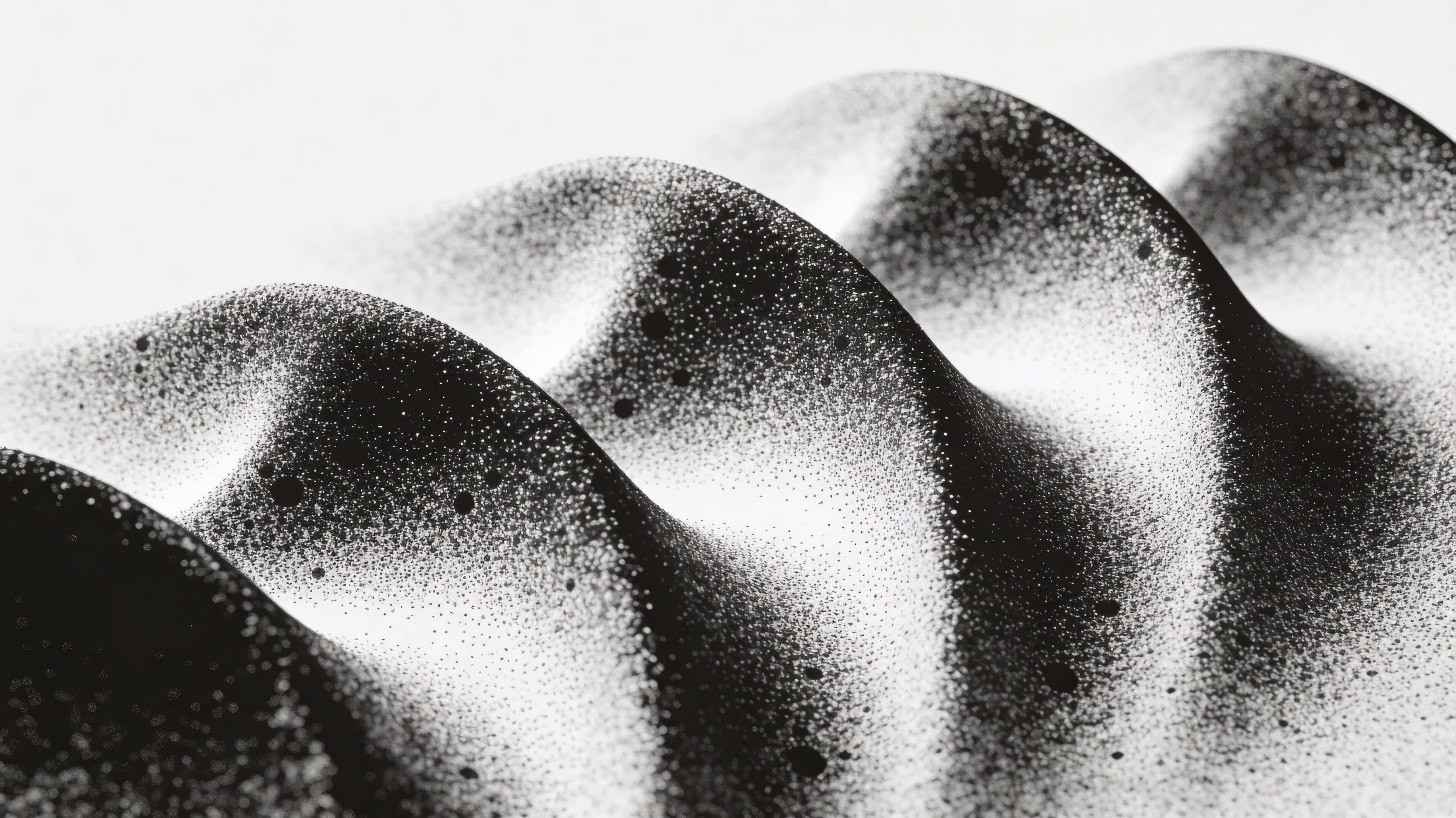 Minimalist black-and-white abstract background of stippled dot waves that flow slowly like a topographic map, with darker dot clusters forming valleys and lighter areas forming peaks in a seamless loop.
