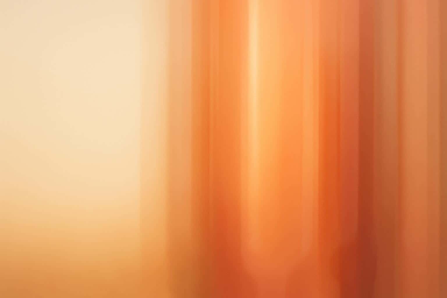 A 3:2 vertical abstract scene of softly blurred, translucent color columns in honey amber, soft coral and muted peach with layered depth, glossy vertical glints, and calm left negative space.